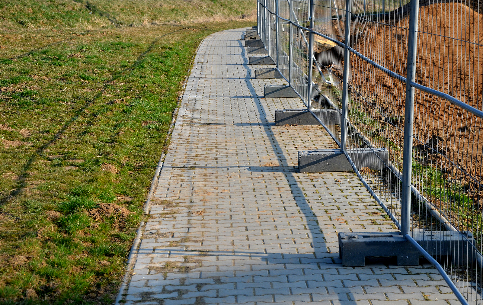 Construction Sites With Portable Fence Parts That Are Installed